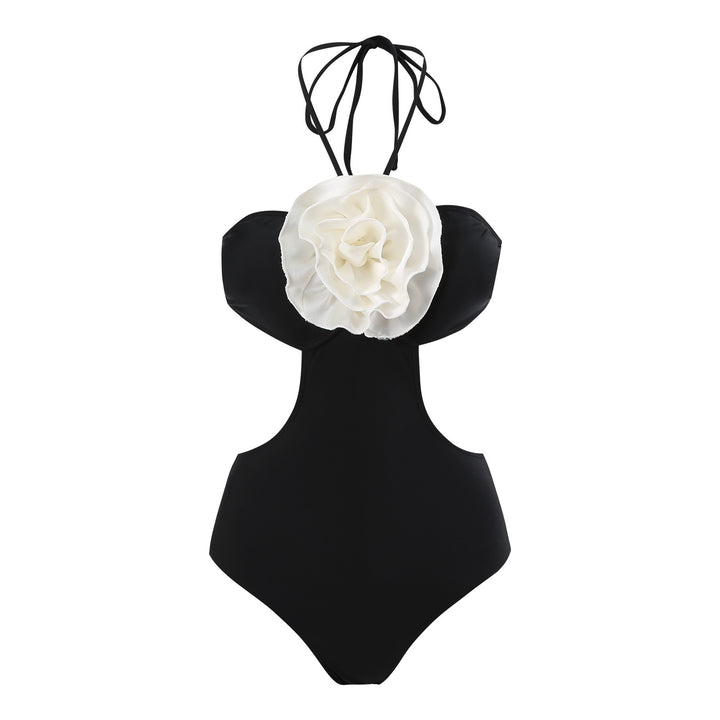 Dame én-delt badedragt med elegant blomsterapplikation Stilla