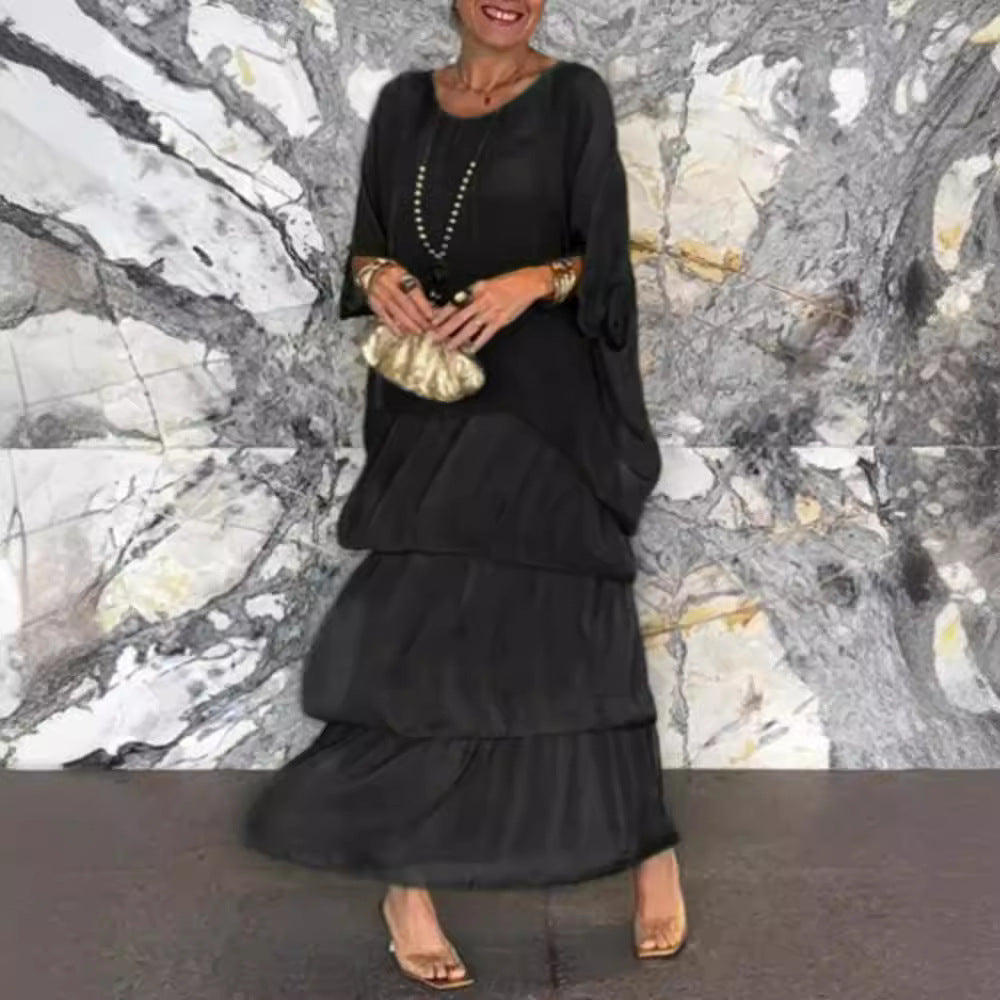 Dame maxikjole med flydende skirt og elegante flæsedetaljer Stilla