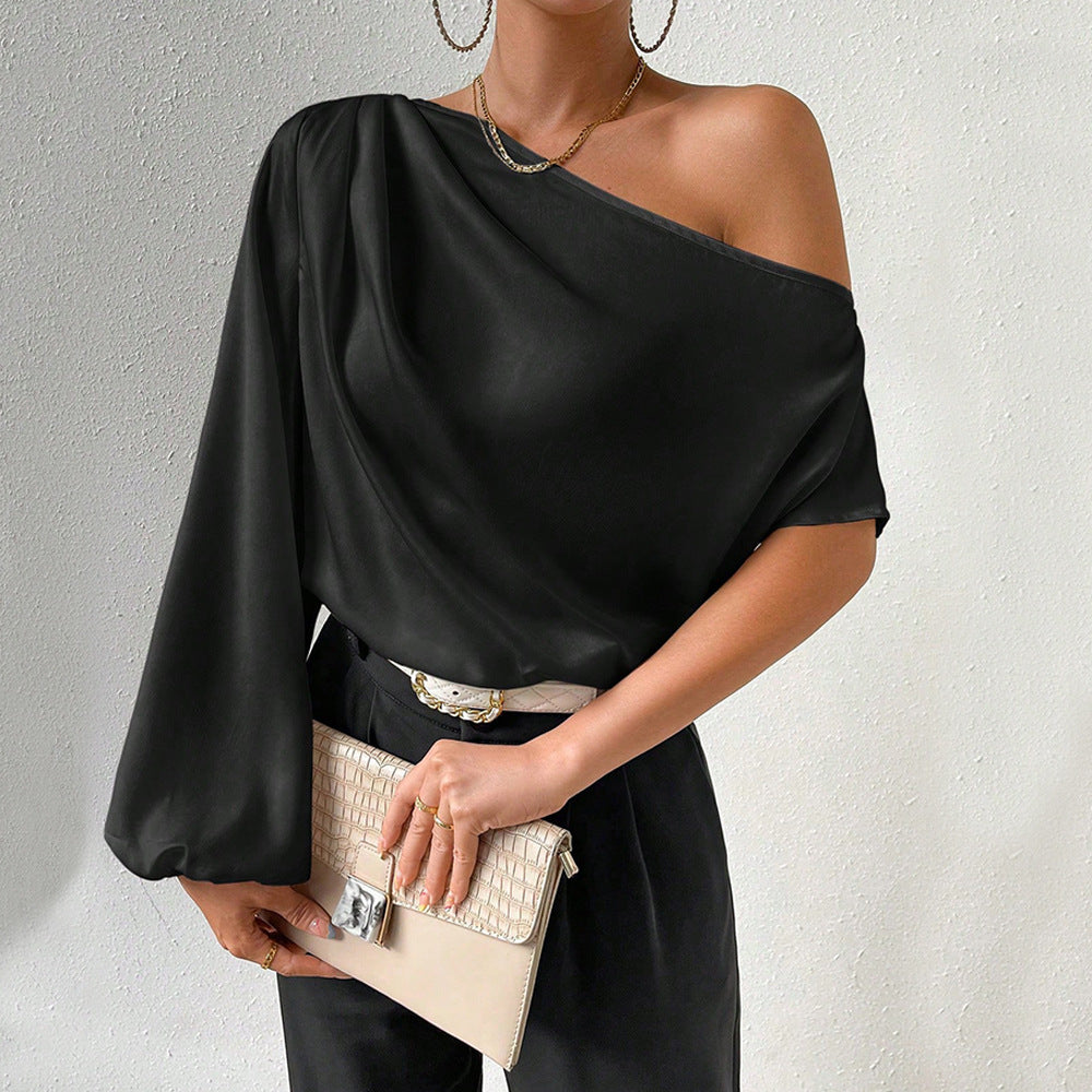 Kvindernes asymmetriske top med elegante puffærmer Stilla