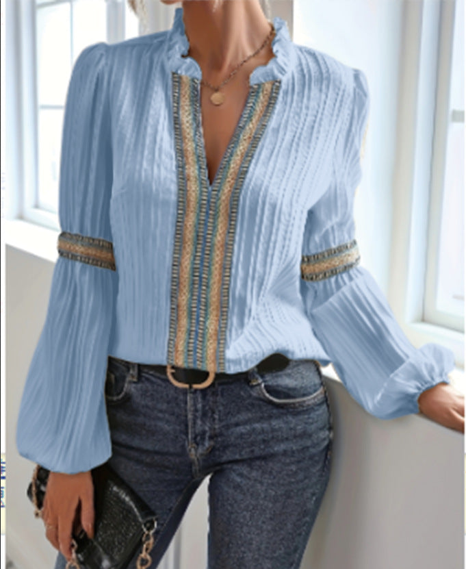 Dame elegant bluse med flæse detaljer og dekorative bånd Stilla