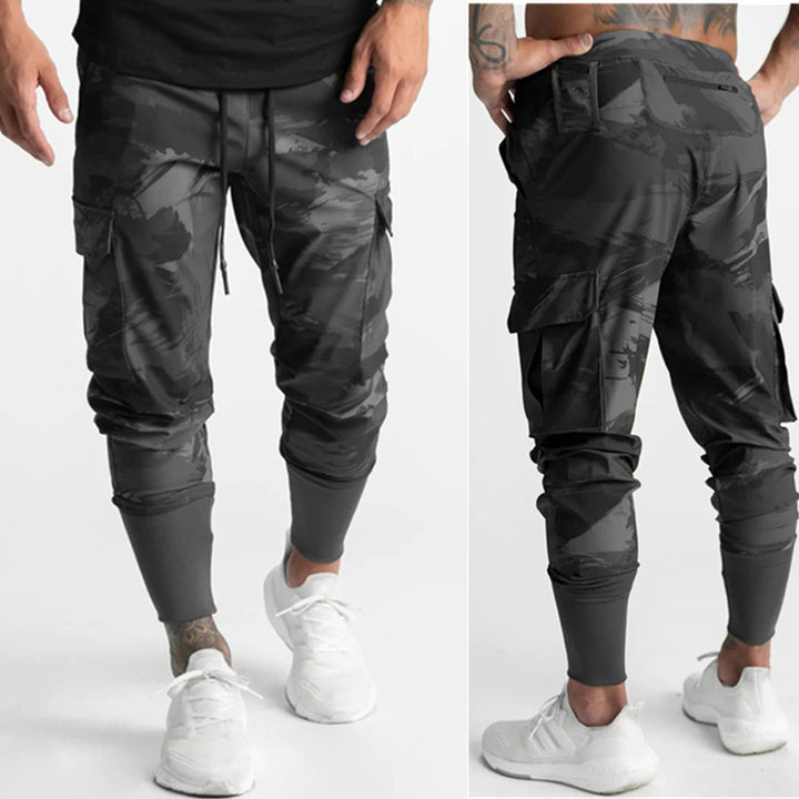 Herrer Cargo-træningsbukser med elastisk talje og praktiske sidelommer Stilla