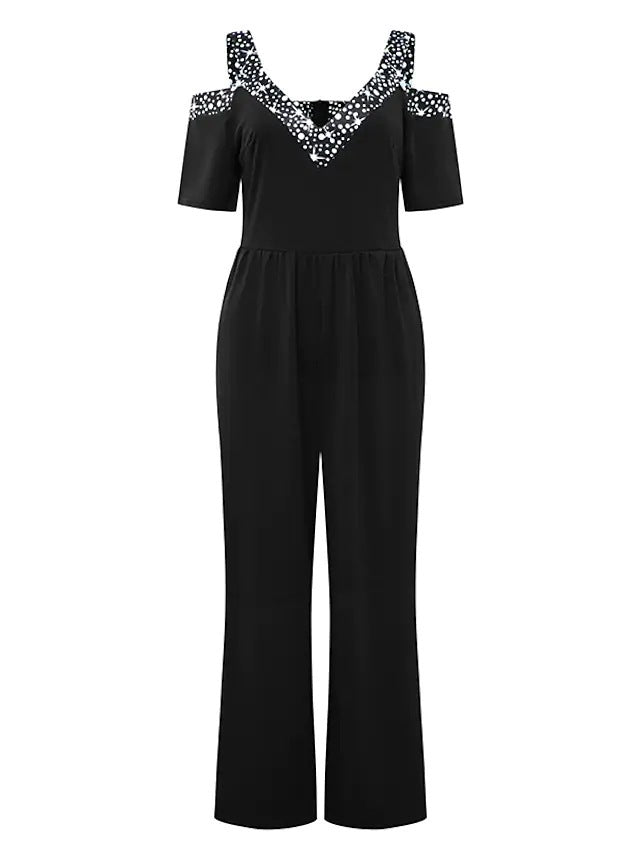 Dame Jumpsuit med elegant V-udskæring og modige cut-outs Stilla