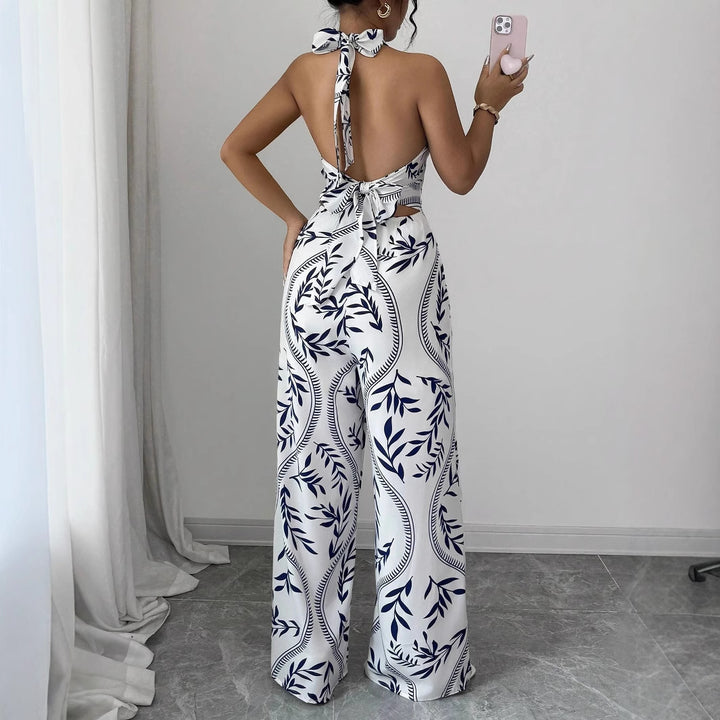 Dame jumpsuit med blomsterprint og smart V-hals Stilla