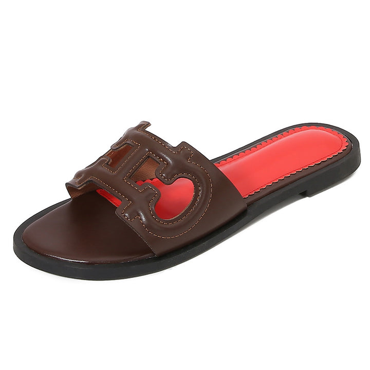 Dame mode slippers med iøjnefaldende logo Stilla