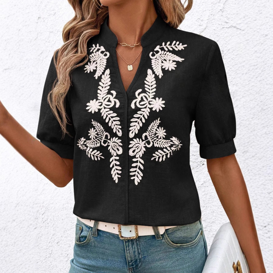 Dame elegant kortærmet bluse med blomstret broderimønster Stilla