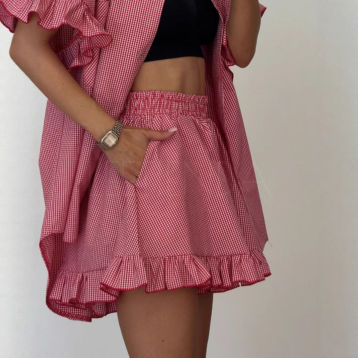Dame Mode Sæt bestående af stribet kort bluse og flæse shorts Stilla