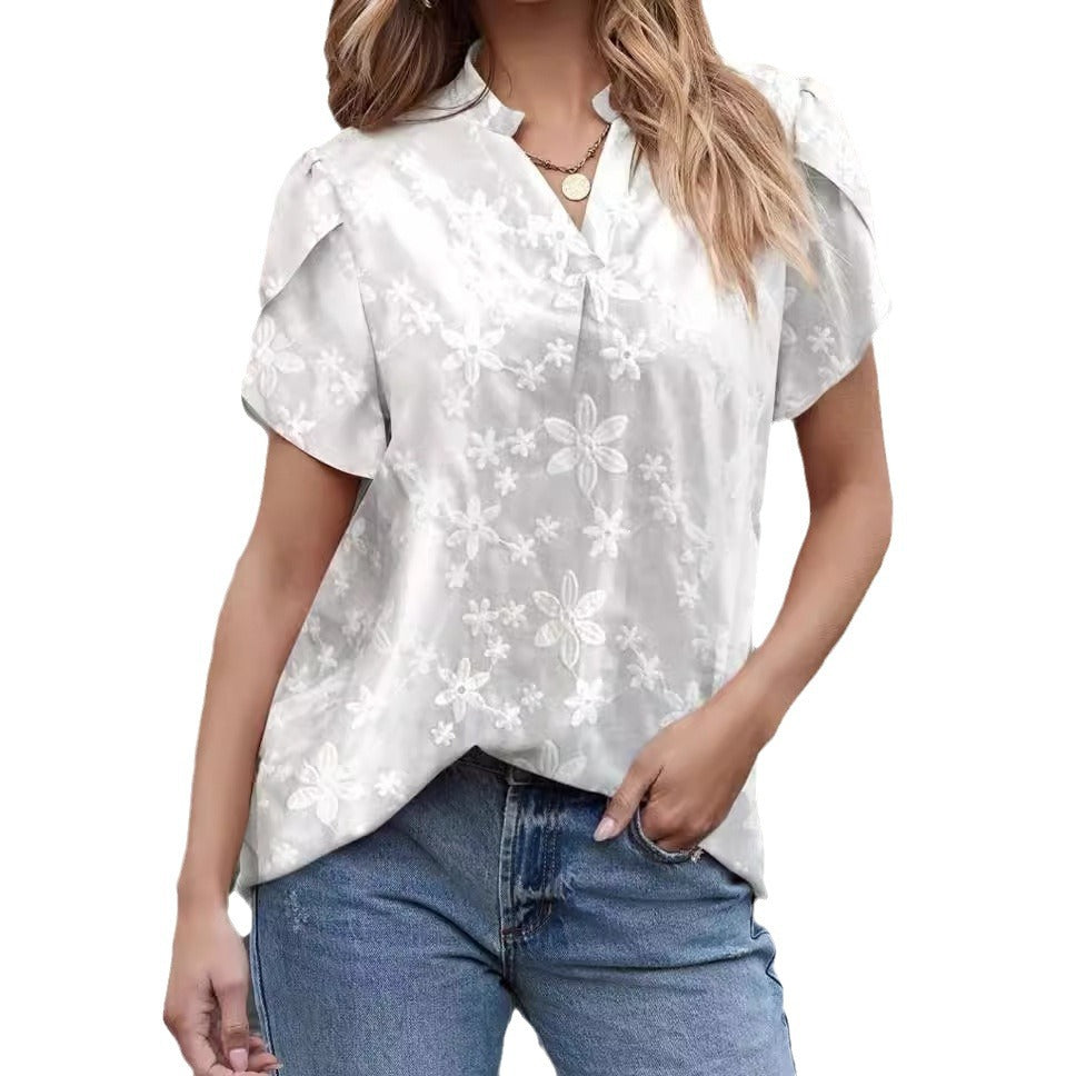 Damebluse med fine broderidetaljer og mode puffærmer Stilla