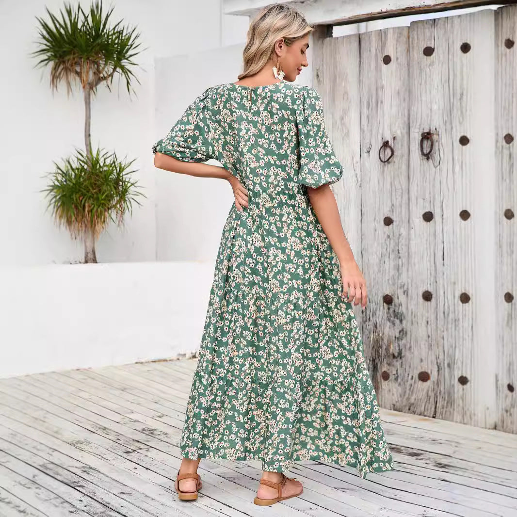 Dame maxikjole med blomsterdesign og luftige pufærmer Stilla