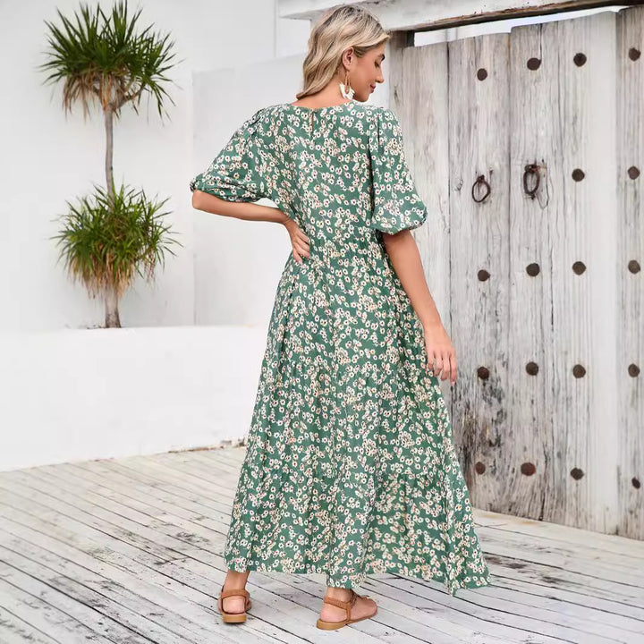 Dame maxikjole med blomsterdesign og luftige pufærmer Stilla