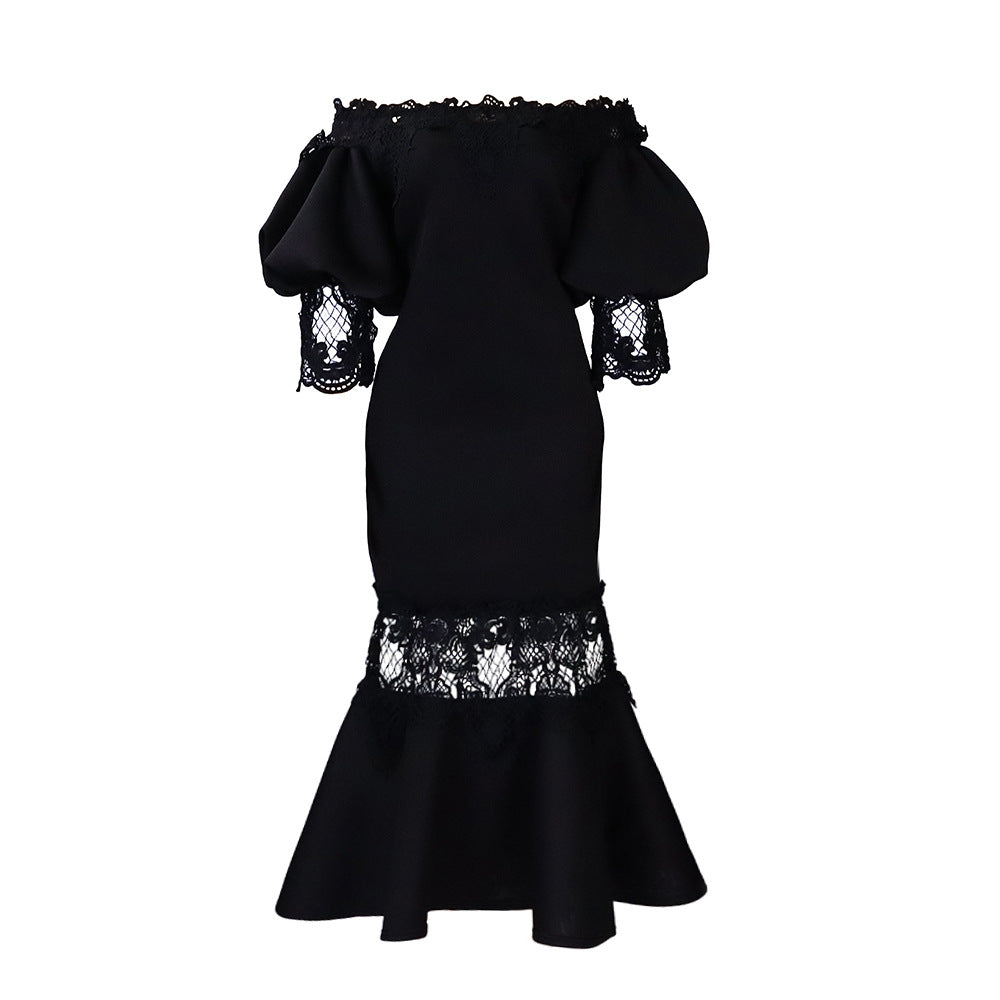 Dame kjole med off-shoulder puffærmer og luksuriøs spidsafslutning Stilla