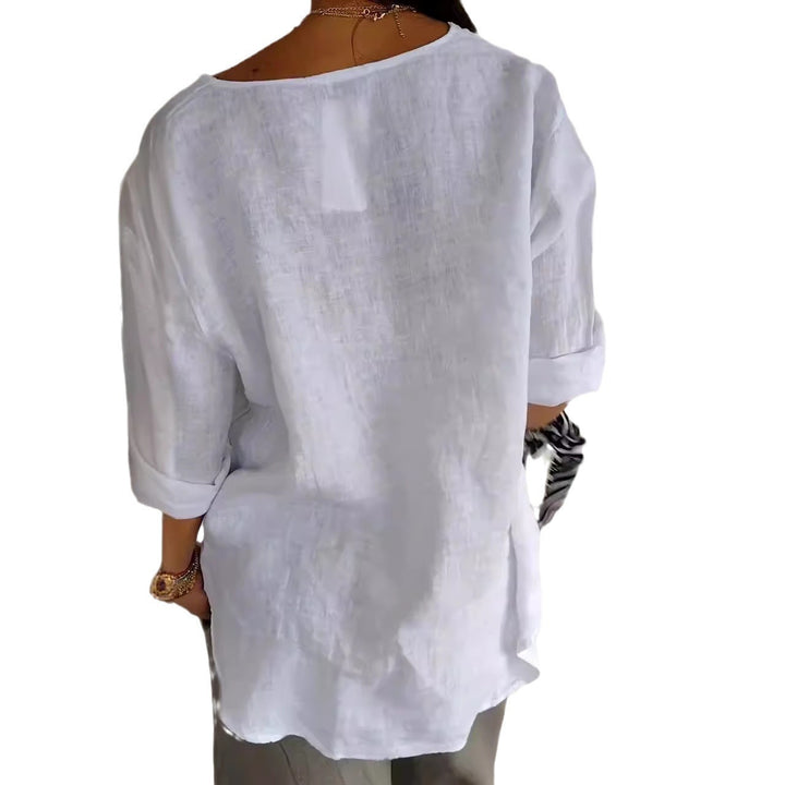 Dame linned blouse med knapdetalje og praktiske lommer Stilla