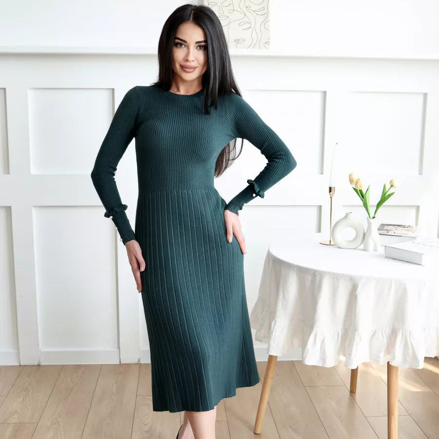 Dame finstrik kjole med elegant ribstruktur og fashionable ærmeaccentuer Stilla