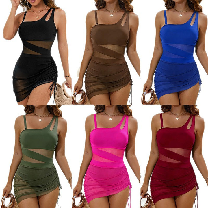 Dame en-delt badedragt med feminine cut-outs og smart ruching Skovae
