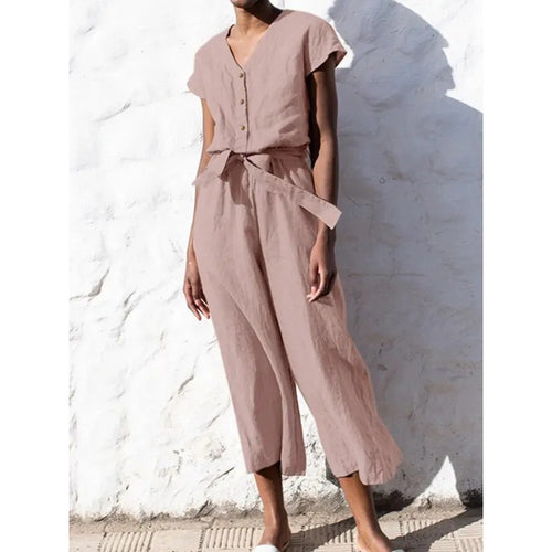 Dame let jumpsuit med taljebind og knapdetaljer Stilla
