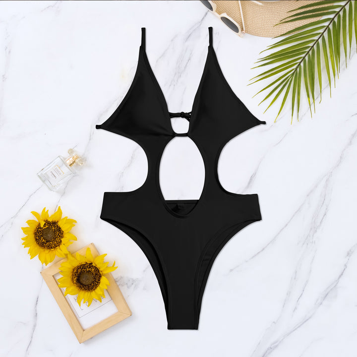 Dame one-piece badedragt med spændende cut-out-detaljer og dyb V-udskæring Stilla