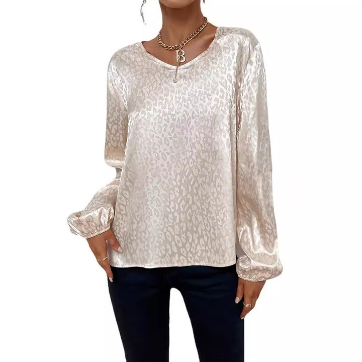 Kvinders elegante bluse top med V-hals og voluminøse ærmer Stilla
