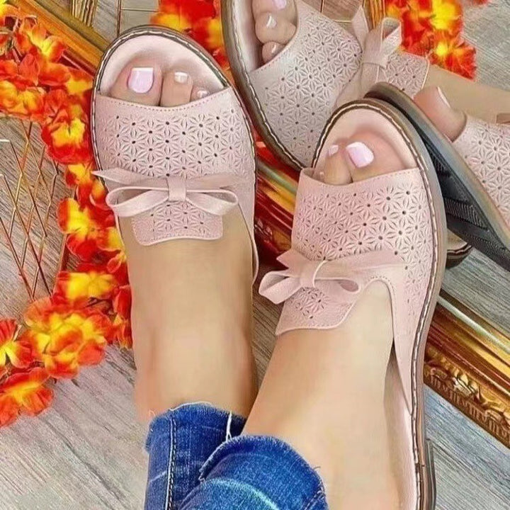 Dame komfortable toe separator sandaler med floral design og moderigtige sløjfe Stilla