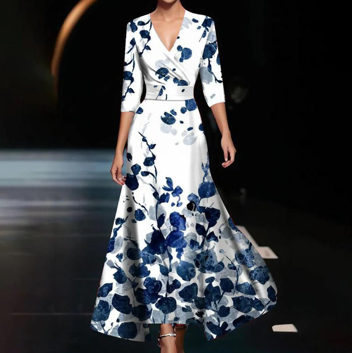 Dame Maxikjole med elegant floral design og dyb V-udskæring Stilla
