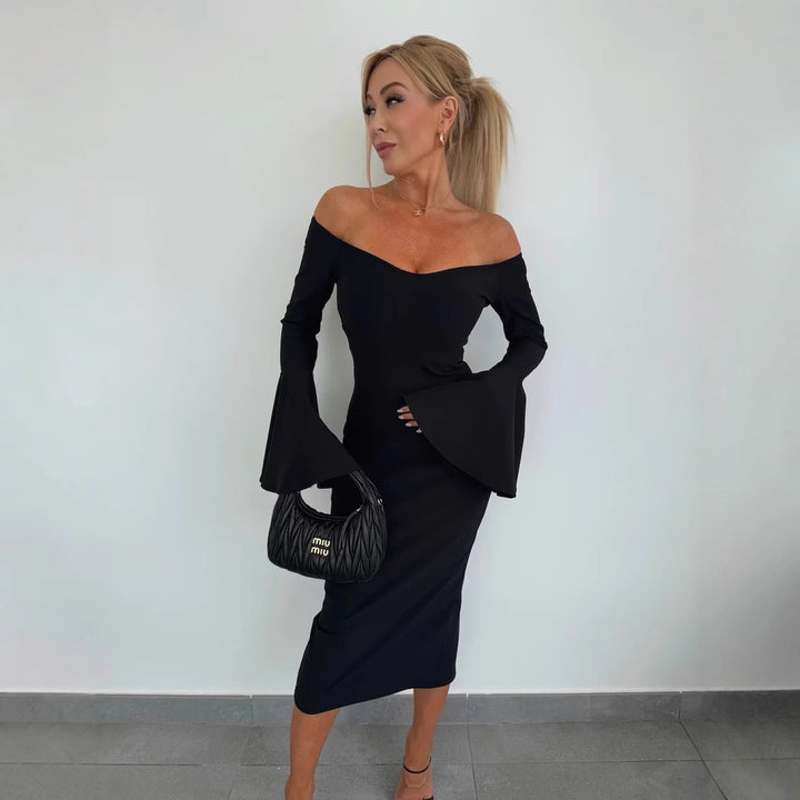 Dame Off-Shoulder Kjole med voluminøse ærmer og lækker silhuet Stilla