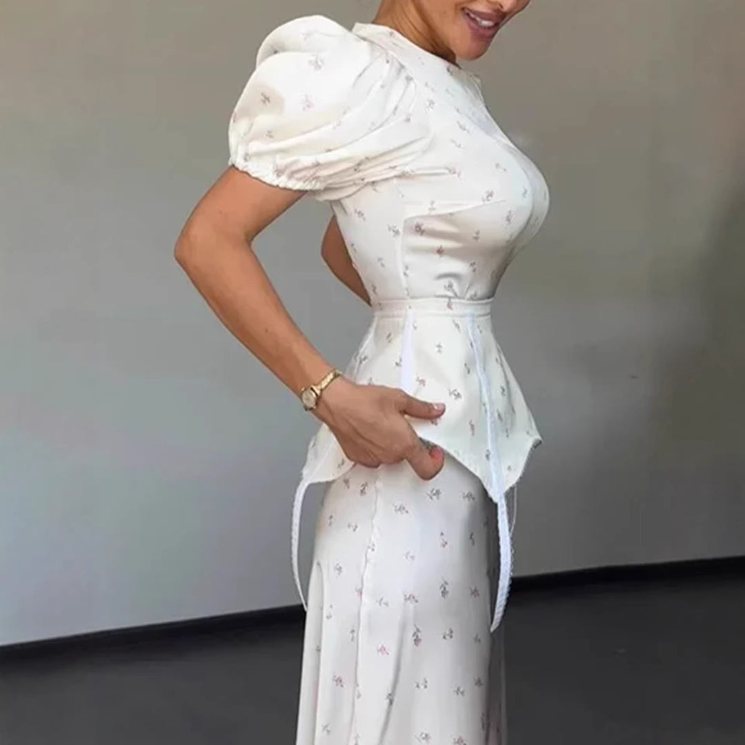 Dame elegant top med ballonærmer og legende detalje på taljen