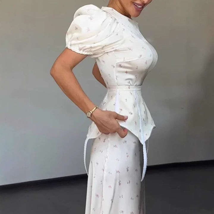 Dame elegant top med ballonærmer og legende detalje på taljen