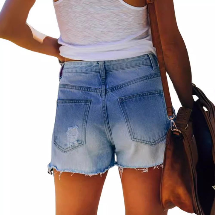 Dame jeans shorts med moderigtigt stjernetryk og slidte detaljer Skovae