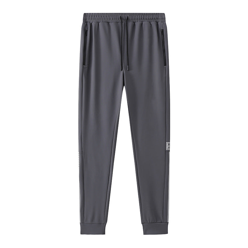 Herrer Sporty joggingbukser med høj bærekomfort og praktiske lynlåslommer Stilla