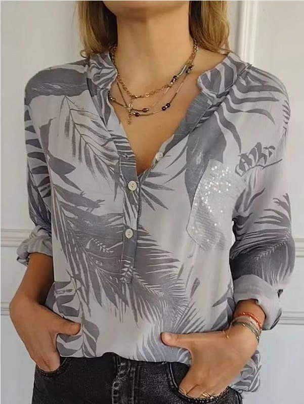 Damebluse med blomsterdesign og glitrende pailletter Stilla