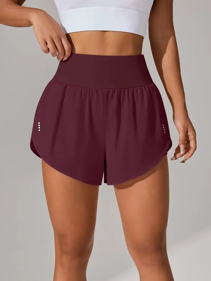 Dame Sporty Løbe shorts med strækbart liv og åndbare mesh-indsæt Stilla
