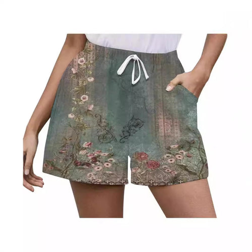 Dame shorts med blomsterprint og sidelommer Stilla