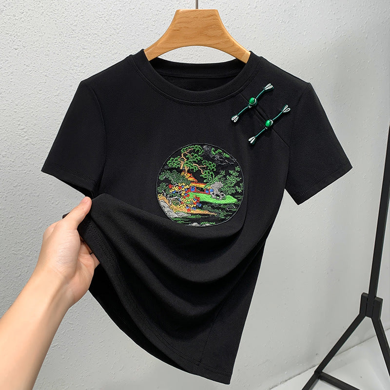 Dame T-shirt med kunstnerisk broderedesign og dekorative applikationer Stilla