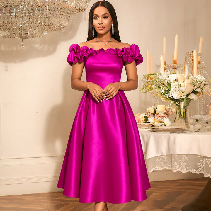 Dame Midi-festkjole med off-shoulder design og voluminøse flæser