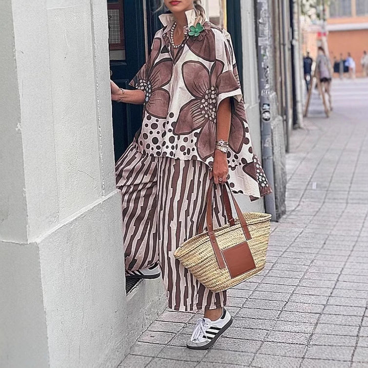 Dame fritidsbluse med moderne blomsterprint og afslappet snit Stilla