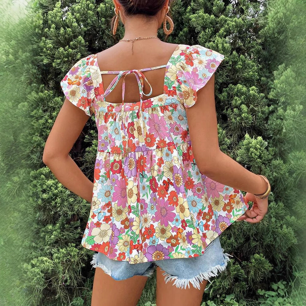 Dame bluse top med floralt print og flæsedetaljer Stilla