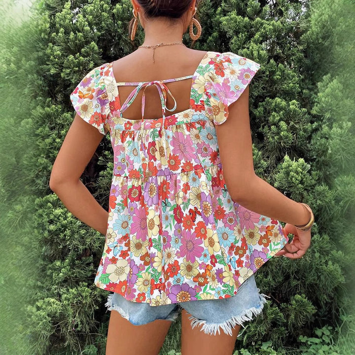 Dame bluse top med floralt print og flæsedetaljer Stilla