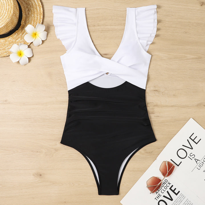 Damer én-delt badedragt med voluminøse flæser og effektfuld indpakningsdesign Skovae