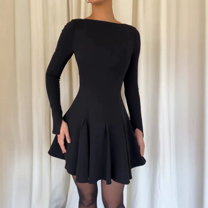 Dame Elegant Mini Kjole med Ærmeløs Design og Svingende Kant