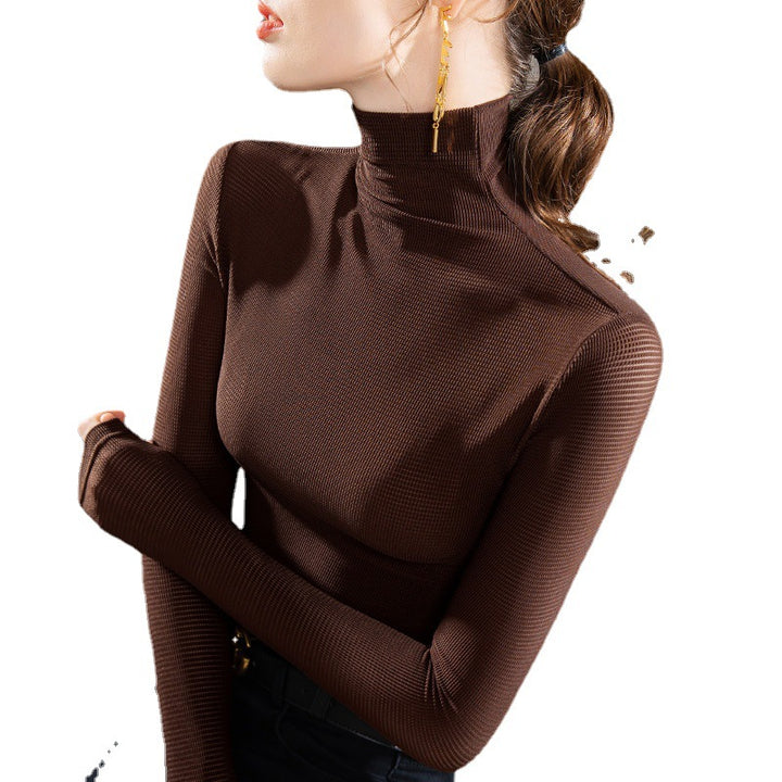 Dame Turtleneck-overdel med fin ribstruktur og elegant snit Stilla