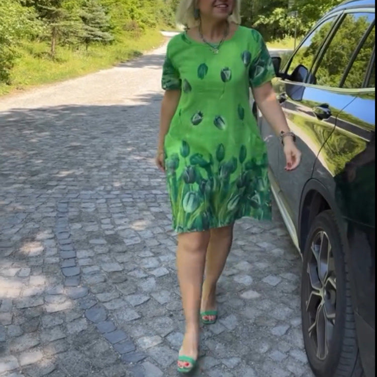 Dame Kortærmet Fritidskjole med florale accenter og let snit Stilla