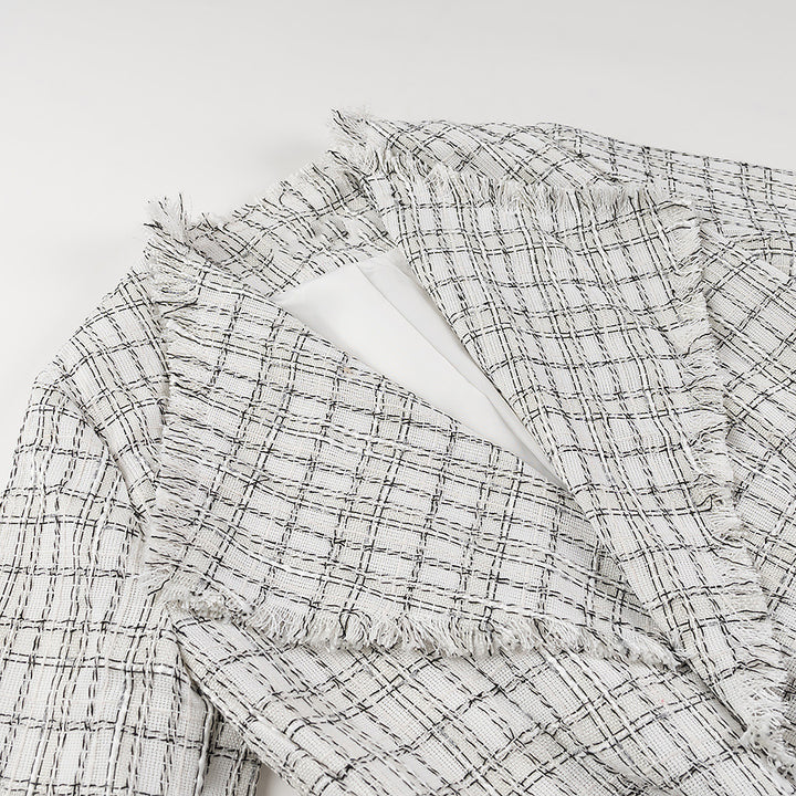 Dame blazerjakke i elegant tweed-design med figursyet snit og praktiske lommer Stilla