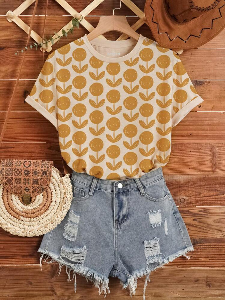 Dame T-shirt med blomstret print i trendy design Stilla