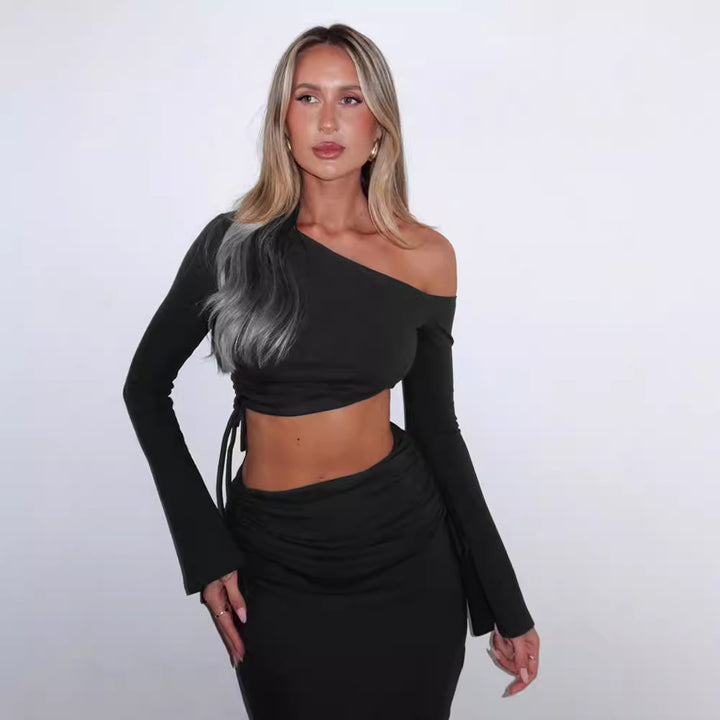 Dame svingkjole med asymmetrisk design og elegant rygvisning Skovae