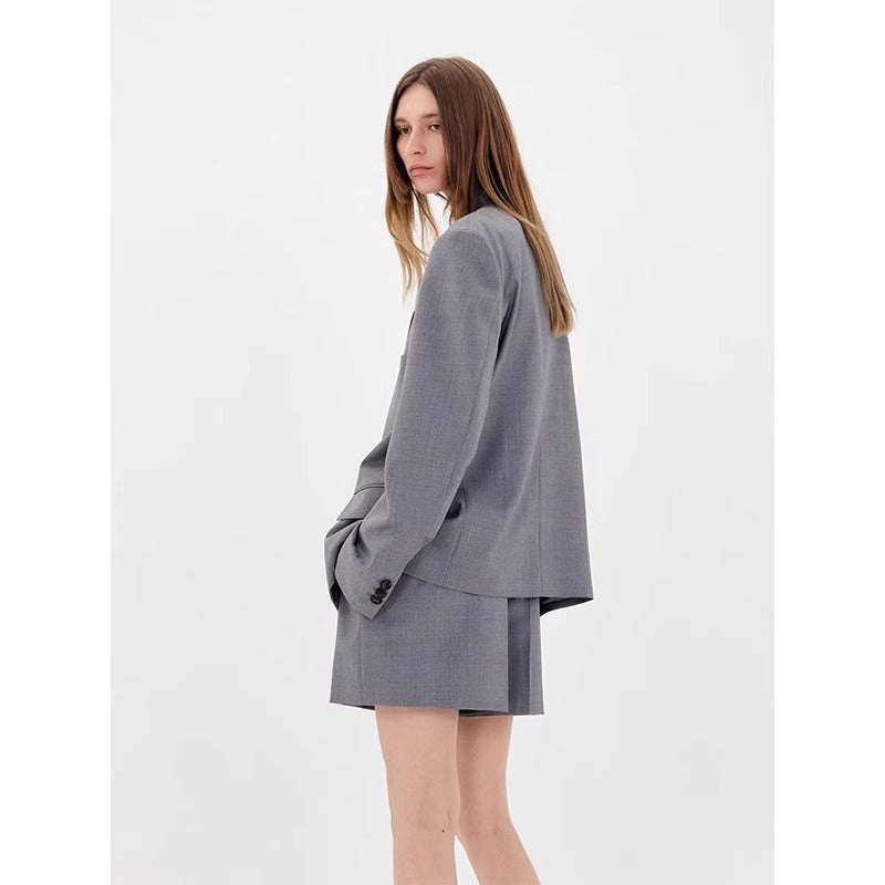 Dame stilfuld oversized blazer med subtilt ternet mønster Stilla