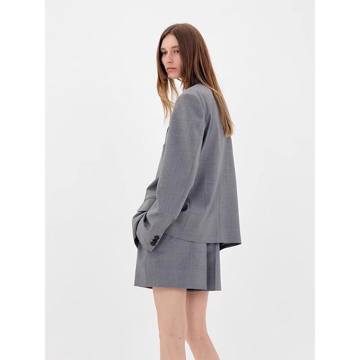 Dame stilfuld oversized blazer med subtilt ternet mønster Stilla