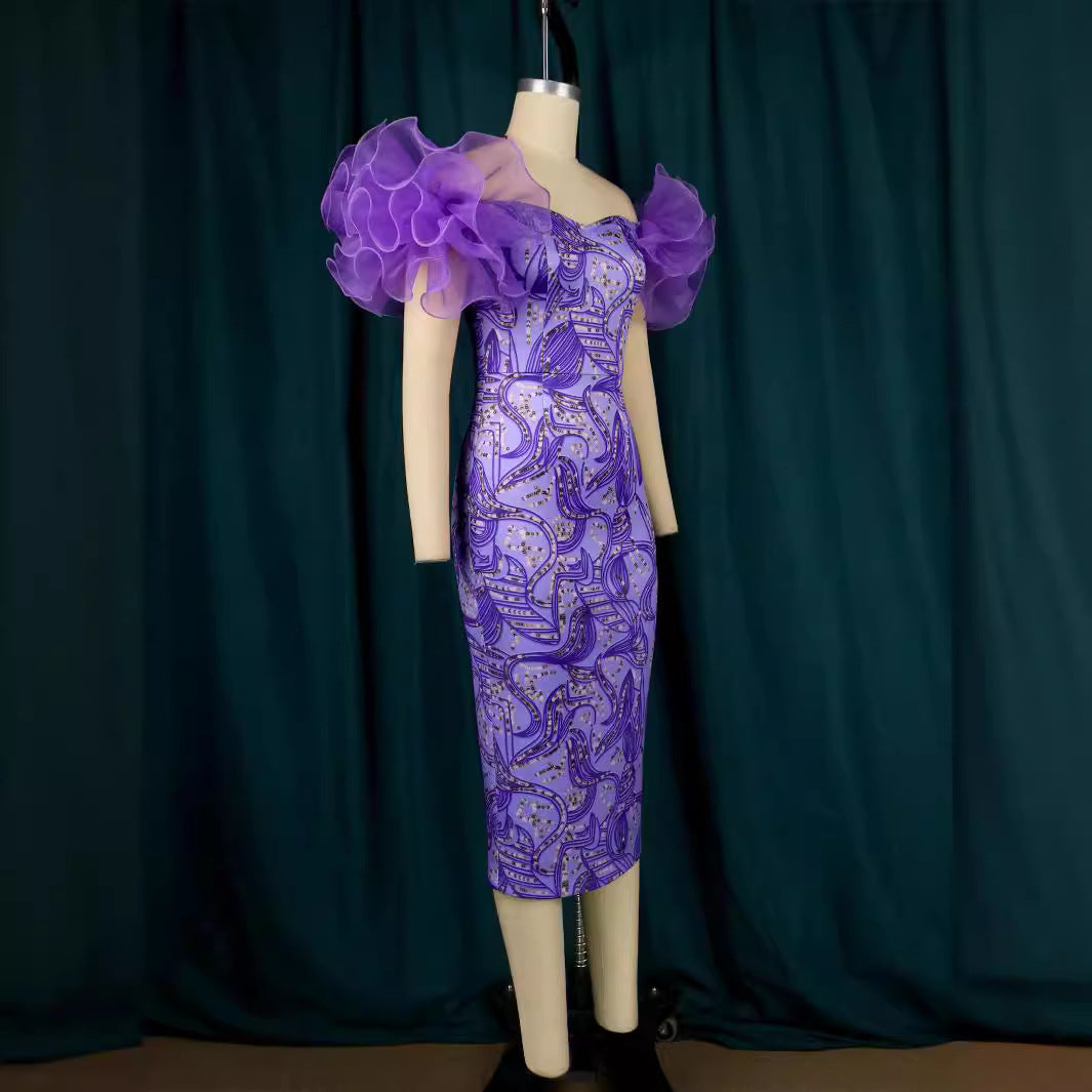 Dame Elegante Midi-Kjole med innovative puffærmer og kunstnerisk tryk Skovae