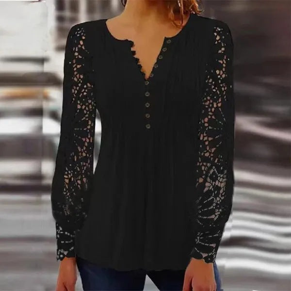 Damer spidsbluse med elegante knapdetaljer og voluminøse ærmer Stilla