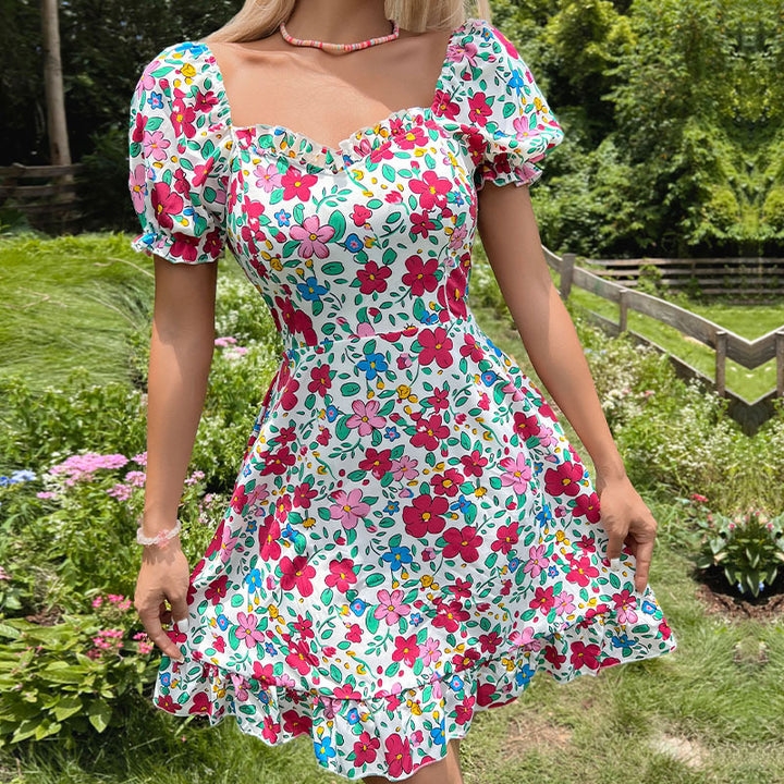 Dame sommerkjole med voluminøse ærmer og blomsterdesign Stilla