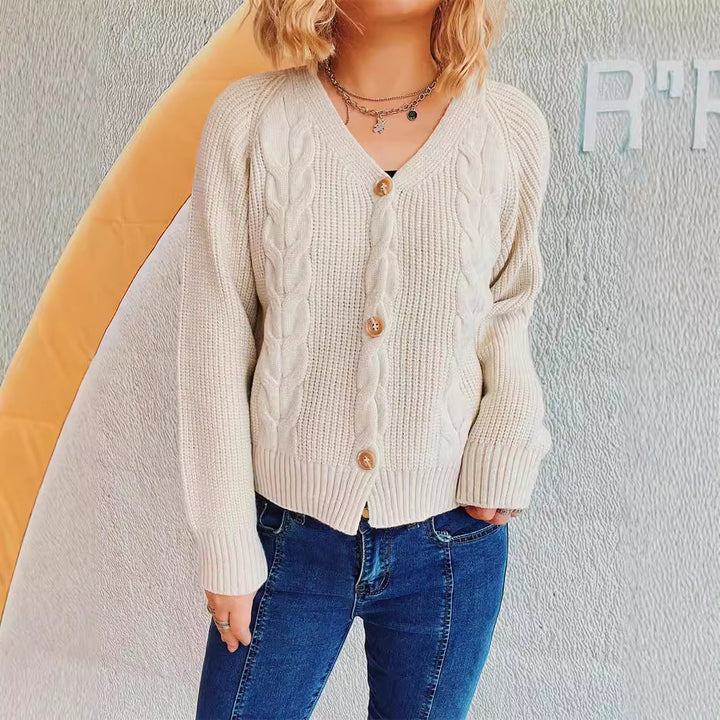 Kvinders cardigan med kabeldesign og knaplukning Stilla