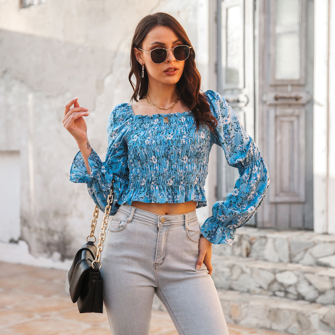 Damebluse med voluminøse ærmer og blomsterprint Stilla