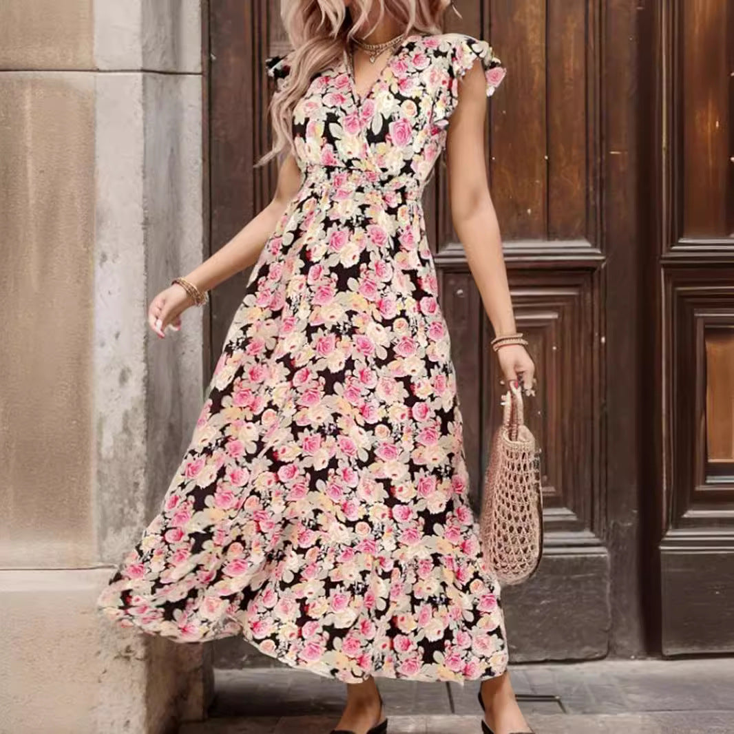 Dame maxikjole med florale flæsedetaljer og dyb slids Stilla